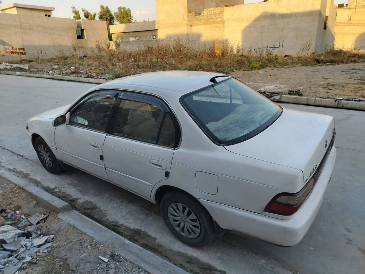 السلام عليكم كورلا موديل ٩٥ رقم دولي نينوى هزة جديدة سنوية إلى ٢٠٣٠ حتى تسقط  سيارة مصبوغة جمالية، فقط باب السايق بيه طخة صغيرة، السيارة احلى من الصورة محرك شرط كير شرط  تبريد يعوزو تصليح الكمبريسر فقط، كابون بانزين شرط التحويل، السعر ٤٨ وبيه مجال خبر وتدلل الرقم  الهاتف *********** رقم الكورك *********** وبيه واتساب العنوان النمرود قرية الحويجة
