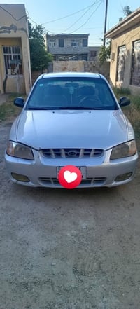 أخوان فيرنا ٢٠٠٢ محرك ١٦٠٠ سياره صبغ عام رقم بغداد الإنكليزي تحويل ثان...