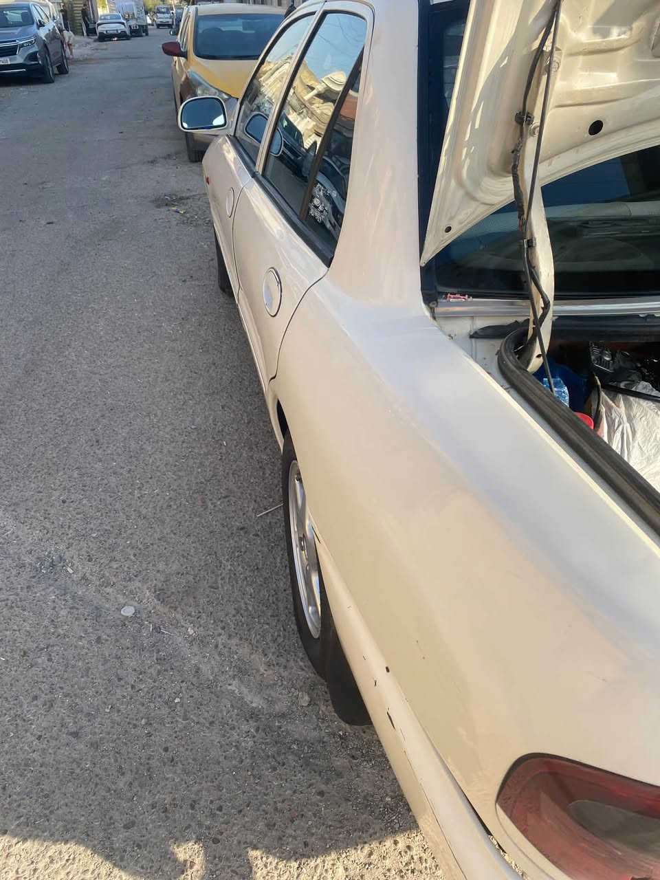 سلام عليكم شباب للبيع براتون موديل ٢٠٠٥ باسمي سياره كير محرك خير من الله تبريد شغال سياره مابيه نواقص بيه   قليل من جاملغ اماميه شويه من بنيد صبغ  بدون حادث سبب انفجار باتري سياره مكان سياره بغداد الشعب لون ابيض كير اوتماتيك رقم سياره بغداد رقم جديد السعر ٤٥ بيه مجال قليل الاتصال ***********
