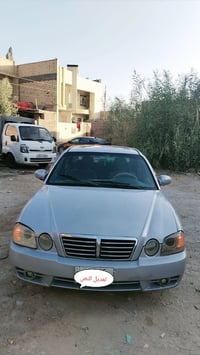 اوبتيما • ٢٠٠٤ • رقم بابل