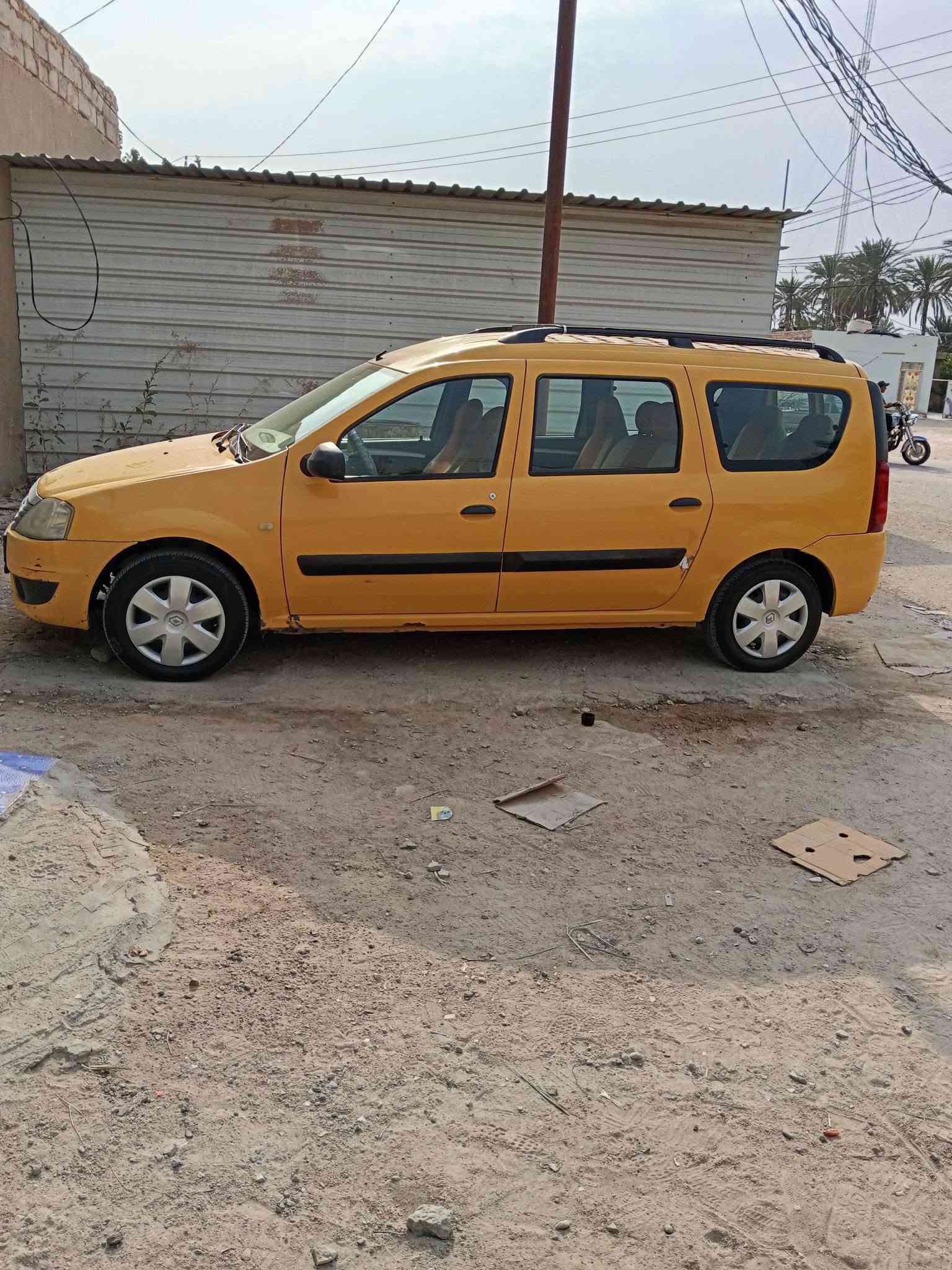 لوجان • ٧ راكب • مكينة وكير