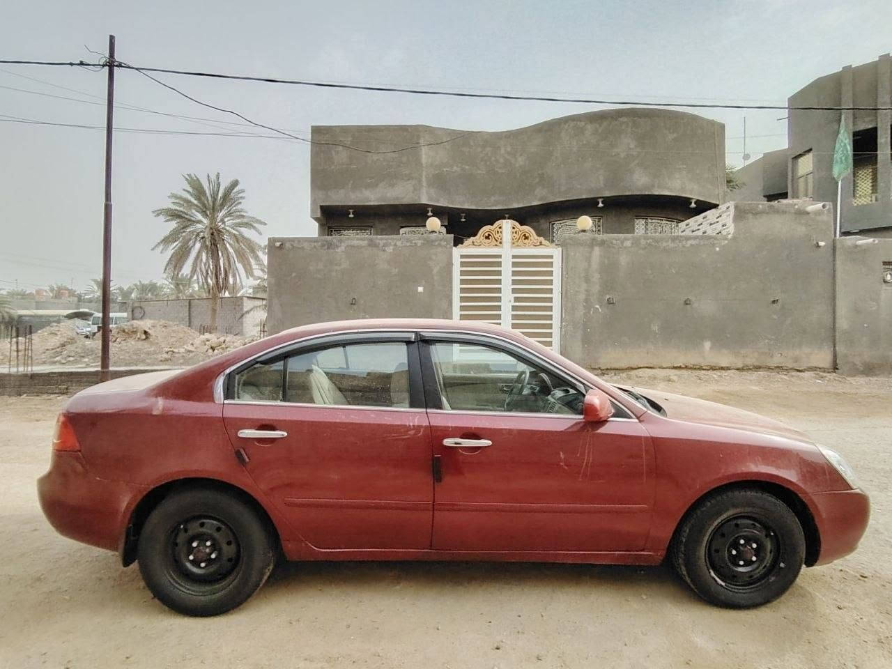 اوبتيما • ٢٤٠٠ سي سي • رقم بغداد