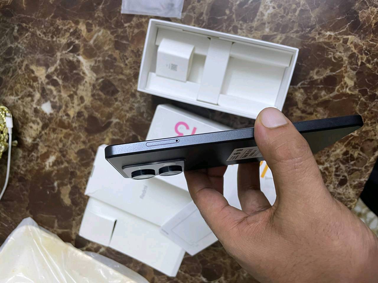 ريدمي نوت 13 5G طك كارتون نضافة 100 شاشة 120هيرتز فريم 120 أو نكول 90 ببجي فول نضافة كامرة 180 مبكة بكسل
ممكن تذكرلي شنو السعة والرام بالضبط؟ يعني 5G شكد جيجا وشنو موديل Redmi Note 13 5G الكامل؟: 
128ذاكرة
الجهاز جديد لو مستخدم؟ وإذا مستخدم، شكد مدة الاستخدام تقريباً وهل بيه أي خدش أو أثر استعمال ولو بسيط؟: 
جديد اي خدش ما بي 
شنو الموجود ويا الجهاز بالضبط داخل العلبة: الشاحن، السلك، الإبرة، الكفالة أو أي ملحقات ثانية؟: 
كارتونة بس 
وين موقعك بالعراق حتى المشتري يگدر يستلم ويفحصه؟ والسعر شكد نهائي لو بيه مجال للمساومة؟: 
بغداد البلديات بي مجال للتفاوض