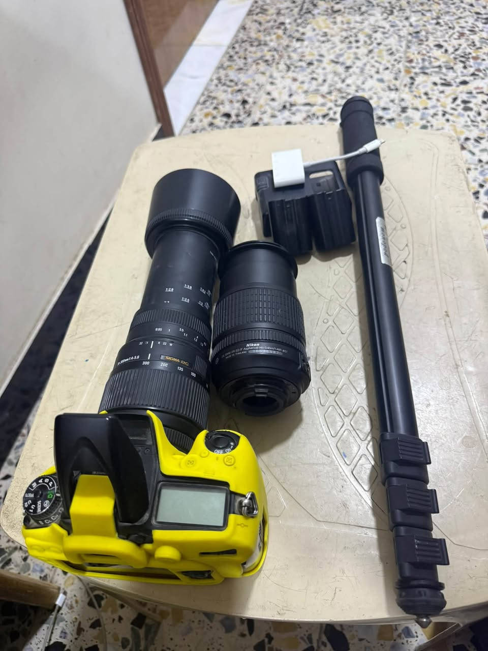 كأمره نيكون D7100وياه عدسات ثنين عدسه105-18و العدسه ثانيه300-70وياه ملحقات بطاريات ثنين +شاحنه +تحويله صور +رام16كيكه و ستان رجل وحده يعني  كامله من كلشي الي يريده يتصل ع هاذه رقم ***********مكاني بغداد الكماليه خدمة توصيل موجوده لكل محافضات العراق
