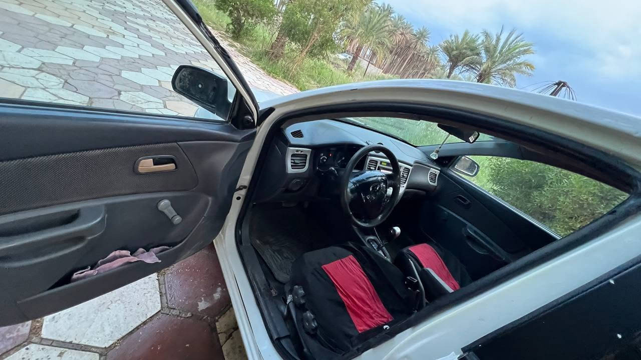كيا ريو • ٢٠٠٨ • رقم بغداد