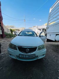 نيسان سه نى موديل ٢٠١٠ ناو فورميگا مه كينه سپى  جه مه لوغلى لاى سه ياق...