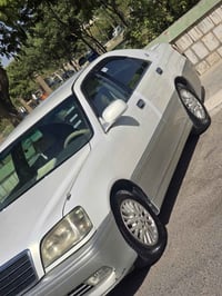 2003 براوة  مةكينة ديفؤري بجووك171 2دووگمة بةردة  4كووشن كارةبا  تةعدي...