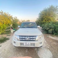 باجيرو • فتحة سقف • تايرات جديدة