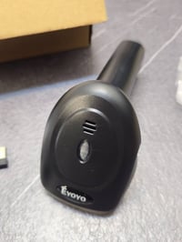 ماسح باركود محمول ماركة Eyoyo (Eyoyo Barcode Scanner)، وهو جهاز يُستخد...