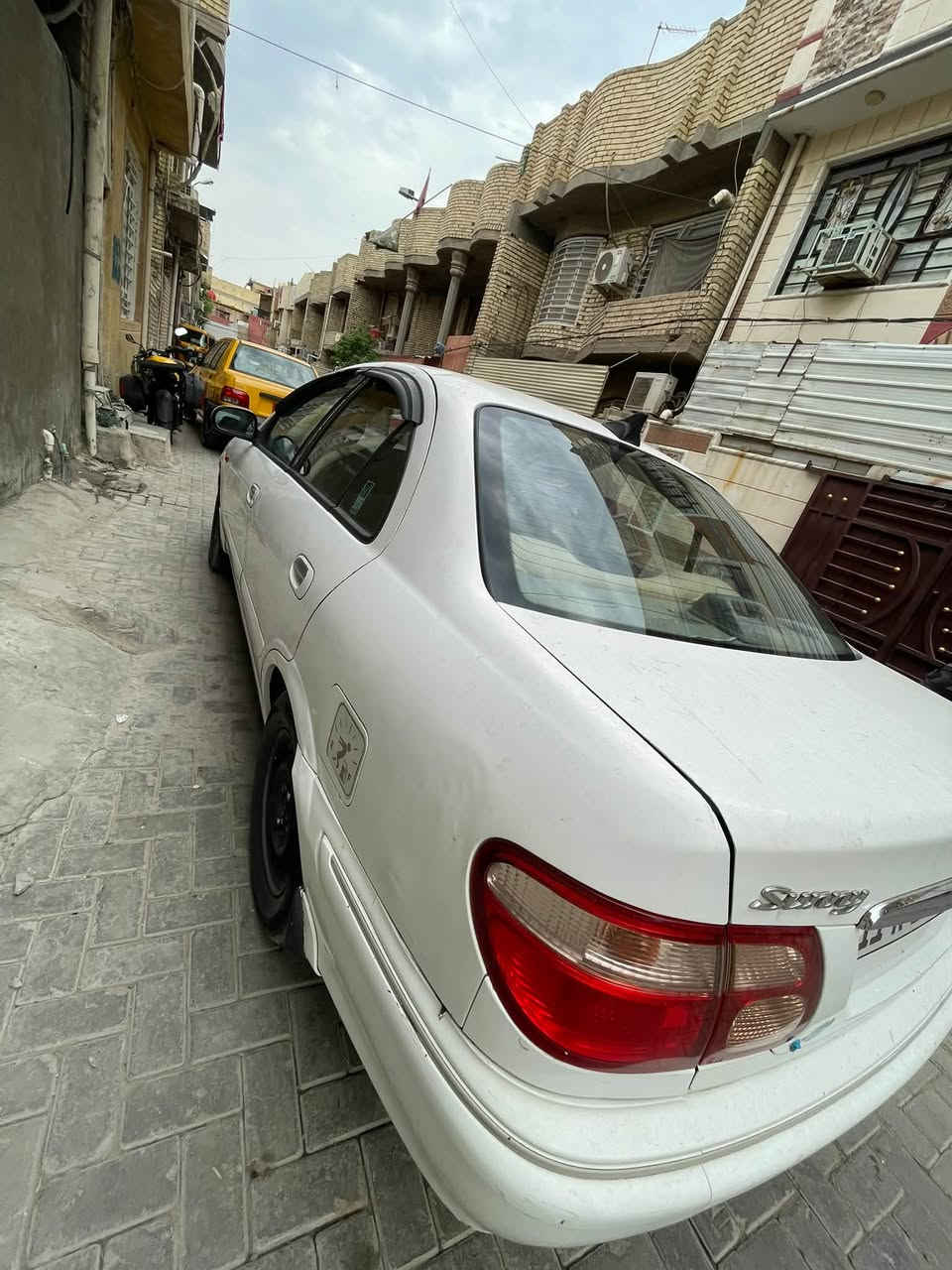 صني 2001 • بأوراق • خالي من الحادث