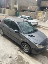 سيارة بيجو 206 موديل 2006 مكينة 1600 كير اوتو ماتيك رقم بغداد انكليزي ...