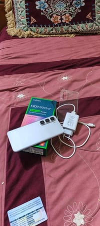 هوت 60 برو+ • مكفول • مع كارتونه وشاحن