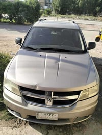 دوج جورني محرك سته موديل 2009 7راكب تبريد تحكم فتحه لون ذهبي مثل ماموض...