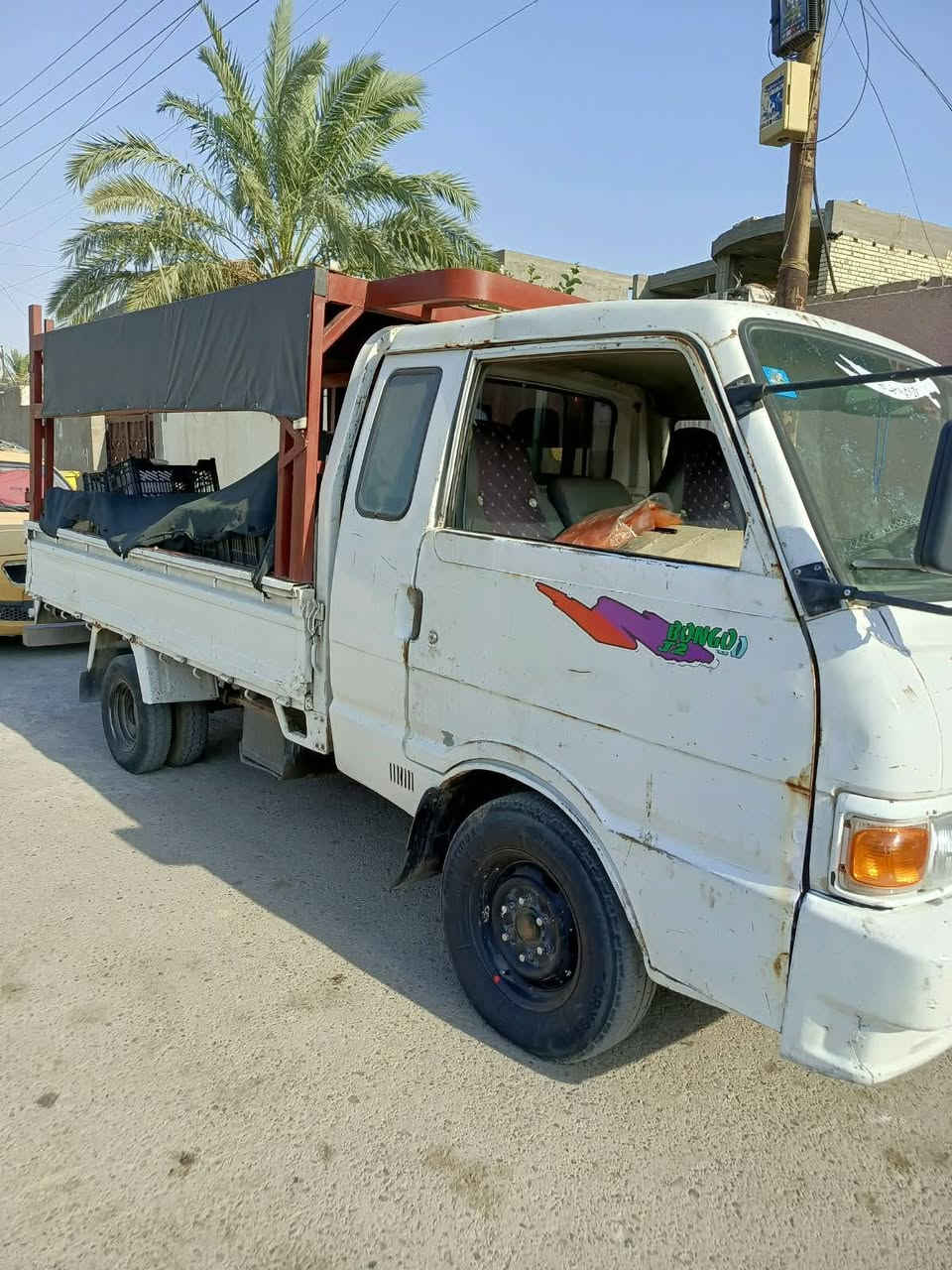 السلام عليكم سيارة بنگو موديل 96رقم بغداد انگليزي بأسمي گير ومحرك خير من الله حداديه جديدة باور ستيرن جديد باتري جديد شاصي رقم الشاصي مكفول السعر 57 وبيهه مجال للطيبين واذا مراوس  بكية اراوس مكان السيارة بغداد بوب الشام *********** أبو حيدر موجود واتس آب
