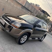 توسان ٢٠٠٩ • محرك مامفتوح • رقم سنوية لحد ٢٠٢٩