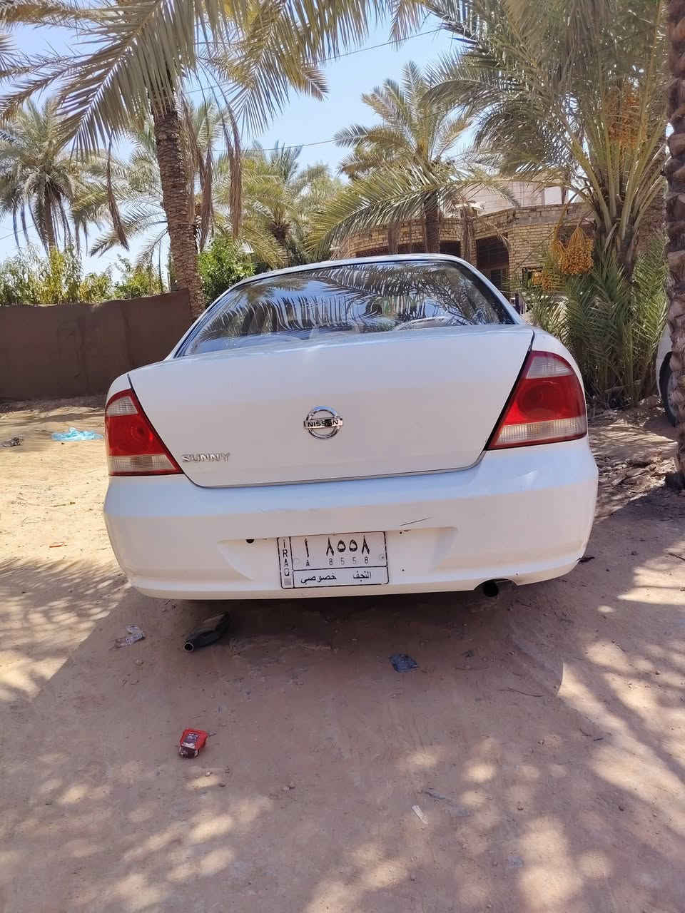 نيسان موديل 8 اوتو قبق اسود نصبتها كلش حلوة بيها بس جنطة والجاملغ الخلفي رقم نجف(***********)
