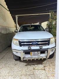 فورد رانجر بيكم موديل 2013 ضرر باب سايق والخلف السايق وشوية بل جاملغ  ...