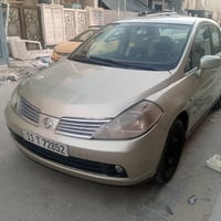 نيسان تيدا موديل 2006محرك 1600كير أوتو تبريد رقم بغداد بااسمي مصبوغه ح...