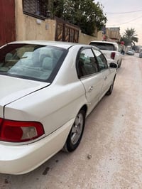اوبتيما ٢٠٠٤ • محرك ٢٠٠٠ • رقم بابل