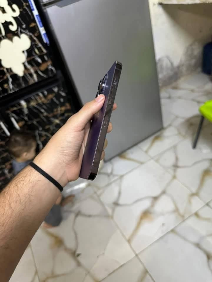 سلام عليكم 📱
> للبيع 14 Pro Max
>
> المواصفات:
> • الذاكرة: 256GB
> • البطارية: 100% مستبدلة جديدة
> • اللون: بنفسجي Deep Purple مبدل ضهر وبيه فطر كلش صغير ممبين 
> •  ، الشاشة مبدلة نوعية ممتازة (3 خيارات)
> • النسخة: شرق أوسط ماستر AAA
> • الجهاز مكفول شغال 100%: اتصال، سيم كارت، فيس ايدي، كاميرات، واي فاي ✅
>
> السعر: 550 الف وبيه مجال بسيط
> يرهم بيع ومراوس

> العنوان: بغداد 
> واتساب: ***********
> تجي تفحص براحتك
