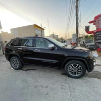 جيب گراند شيروكي لمتد 2021 فول مواصفات 1/1 ماشية 100 الف ميل جلد  تحكم...