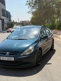 بيجو 307 • ٢٠٠٥ • جير اوتو