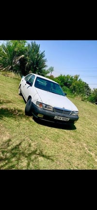 نيسان سني موديل 2000 جاهزه السعر 55ورقه رقم الجوال 07831866295/0751927...