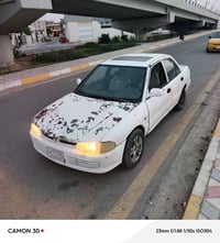 لانسر 1993 • خضرة • كهربائيات شغّال