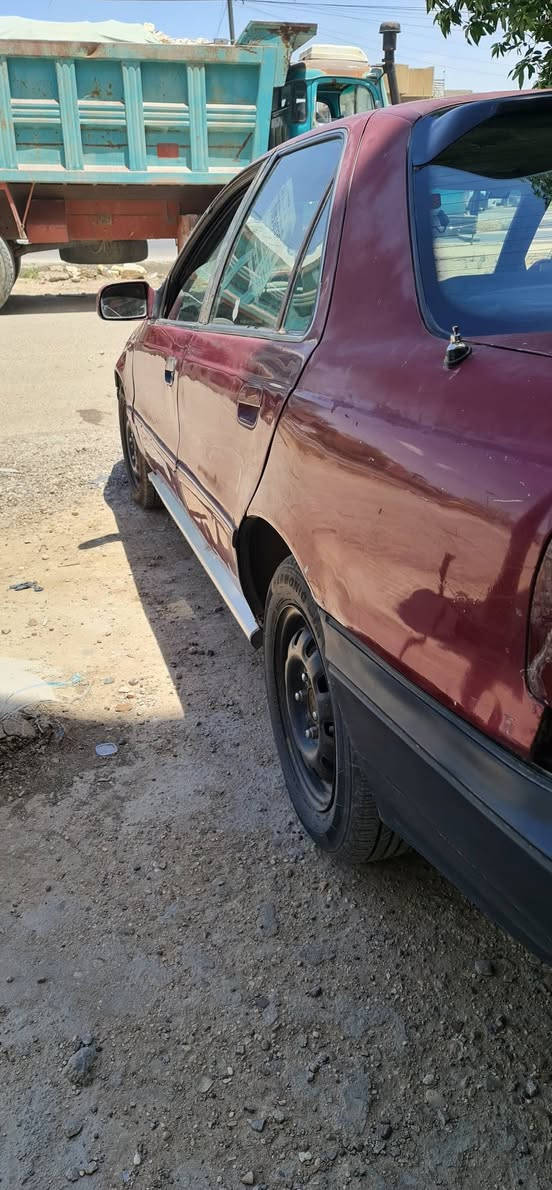 النترا موديل ١٩٩٤ رقم دولي بأسمي 
محرك مفتوح قبق اسود كير اوتوماتك سيارة جاهزة من كل شي تخم تاير باتري جديد ترايك وين مايعجبك صدرهة ٦٠% فرممات بلاد بدون اي لحيم شواصي مكفولة . مكاني الدورة ابو دشير هاتف *********** .
