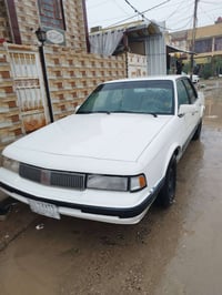 للبيع اولدز موبيل موديل 1990 رقم بغداد لون ابيض صبغ عام بدون ضرر فقط ص...