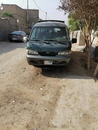 باص ١٤ راكب • موديل ١٩٩٩ • رقم بغداد