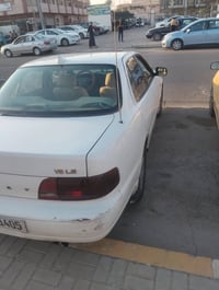 ،،، كامري لون ابيض موديل 95 رقم بغداد انگليزي سياره حلـوه بلادي ما محو...