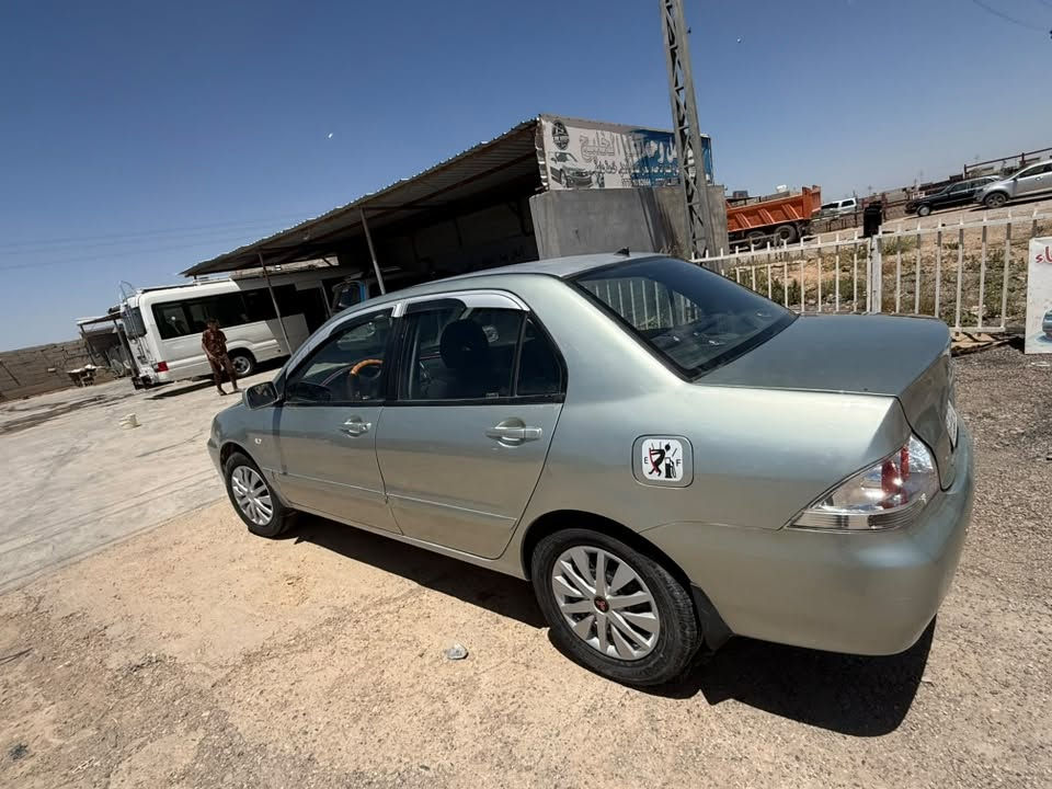 لانسر بومة مديل 2008وارد امريكي 
مصبغوة حزام وبيها ضربة بل جاملغ الايمن كير ومكينة مكفولات تبريد شغال ويه السويج  السيارة ما بيها اي نقص عدة الصدر الخلفي ناقصة بوش وهاذا هوة رقمها ديالى عنواني ديالى بعقوبة ***********
