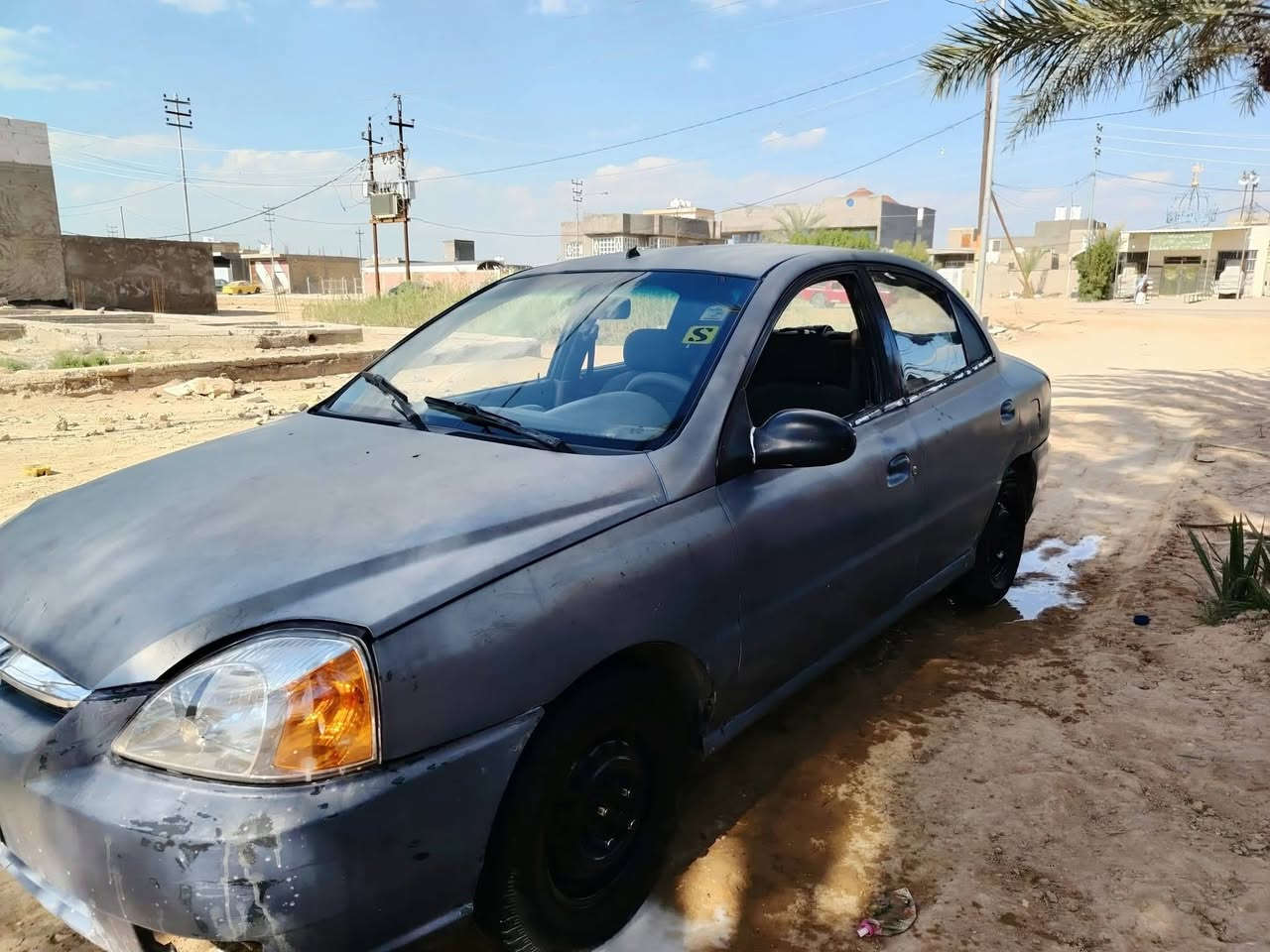 كيا ريو • ٢٠٠٤ • كوفه شارع معمل