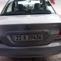لانسر ٢٠٠٩ • محرك زين • رقم سليمانيه