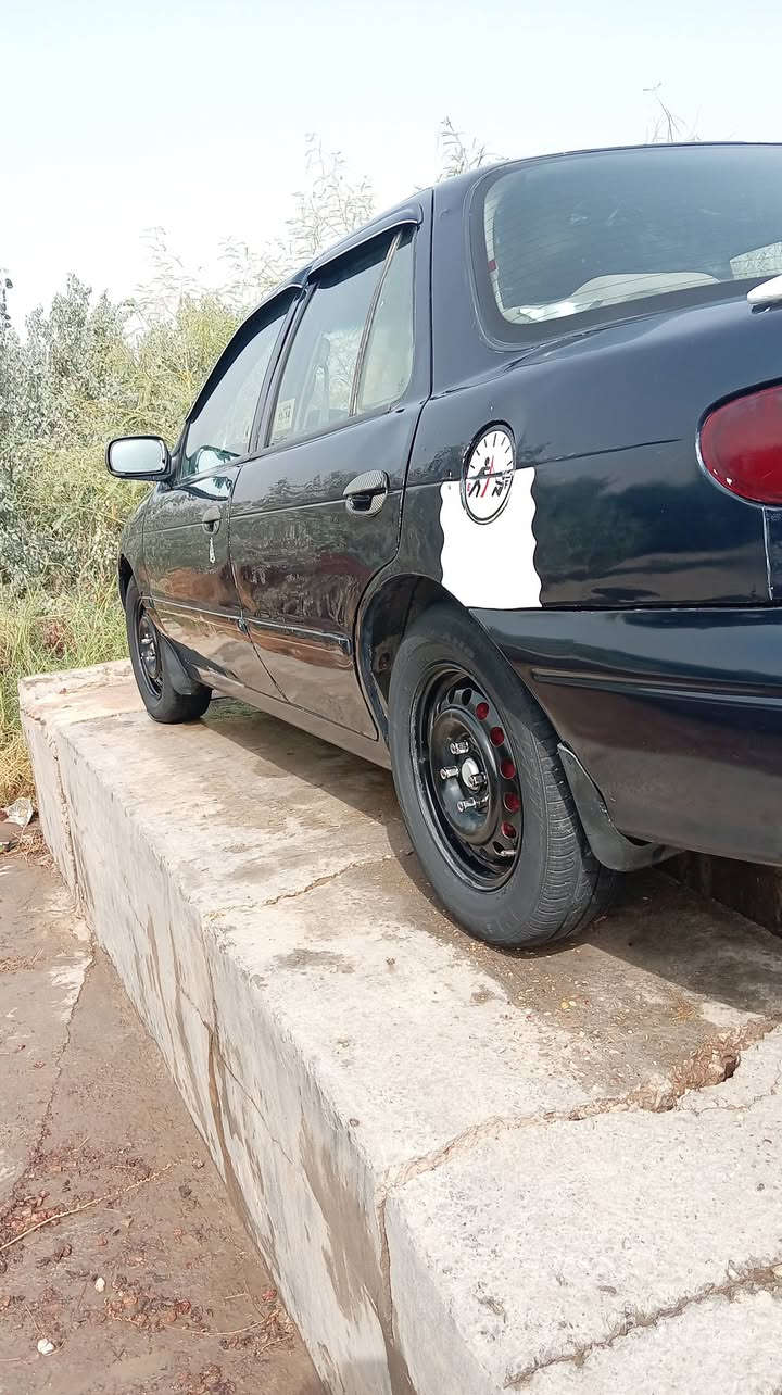 كيا سيفيا • باسمي • رقم بغداد