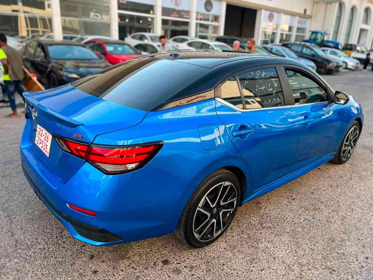 نيسان سنترا SR 2025 ماشية ١٨ 
سقف اسود بلاد فول مواصفات كشن هيتر لايت زينون سقف اسود ويل كروم ١٨ بصمة رادارت حساسات كير محرك تبريد كلها شرط كاتي تترقم اربيل سليمانية بيها تبديل باب بلاد نفس اللون وباب جملغ امامي صبغ مع حافة بونيد بجم خلفي كبس راديترات لايتات بلاد شرط الفحص مكان سيارة كركوك شراي اتصل واتس اب موجود *********** كركوك, العراق

نص مكتوب في الصور:
- ***********
- ***********