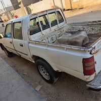 محرك وكير مكفول • ٢٠٠٦ • رقم بغداد إنكليزي