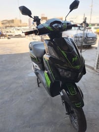 دراج شحن سكنس 6بطاريات بصمه وسويج تشغيل عن بعد جهاز  سرقه الدراجه أحلى...