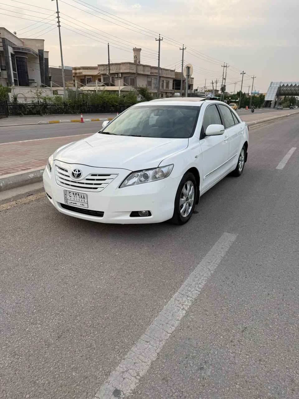 كامري ٢٠٠٩ • بدون صبغ • رقم بغداد