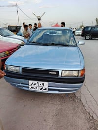 مازدا 323 • صبغ عام • محرك و گير