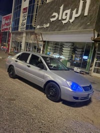 لانسر ٢٠١٠ • رقم بغداد • باقي كفاله