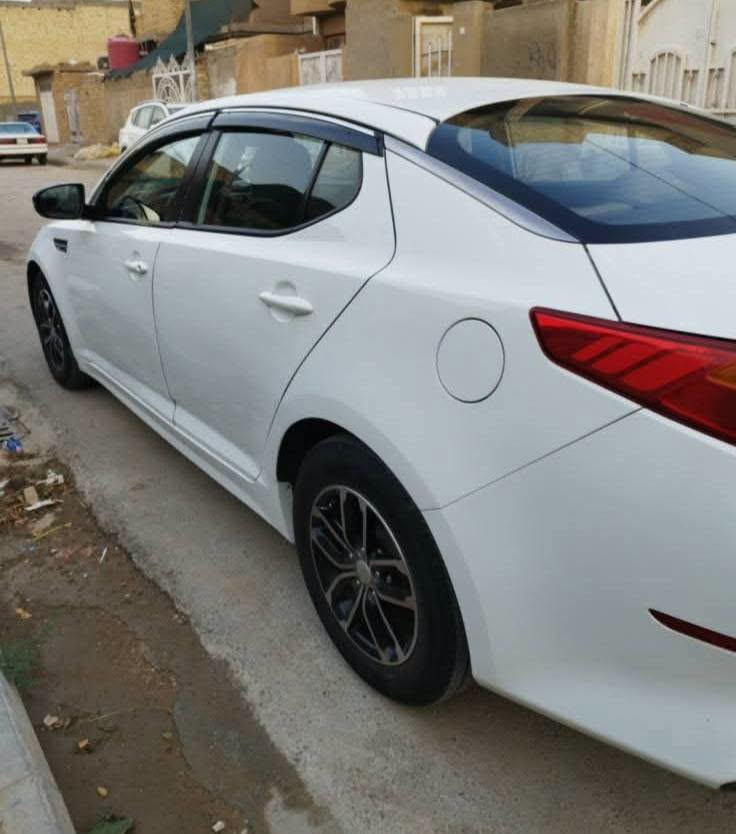 أوبتيما 2014 • مكينة 2000 • وارد كوري