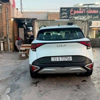 سبورتج 2024 ابيض خليجية السياره مكفولة من البارد  والحادث والصبغ سياره...