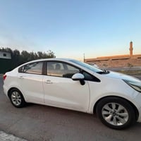 كيا ريو ١٧ خليجي ابيض مكفوله ماشية ٧٣ رقم بغداد  ٠٧٧٠٦٤٧٨٩٠٦  السعر ٩٥...