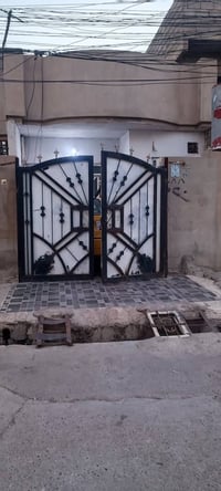 حي صدام • ١٠٠م • غرفه ١