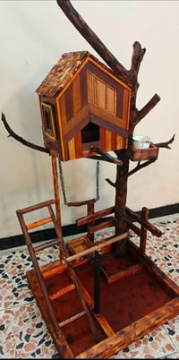 إستاند طيور خشبي  للاستفسار متواجد     واتساب   07763940284 يوجد توصيل