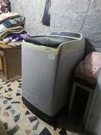 غسالة للبيع اوتماتيك  شغالة السعر250وبيهة مجال رقم الهاتف     07710971...