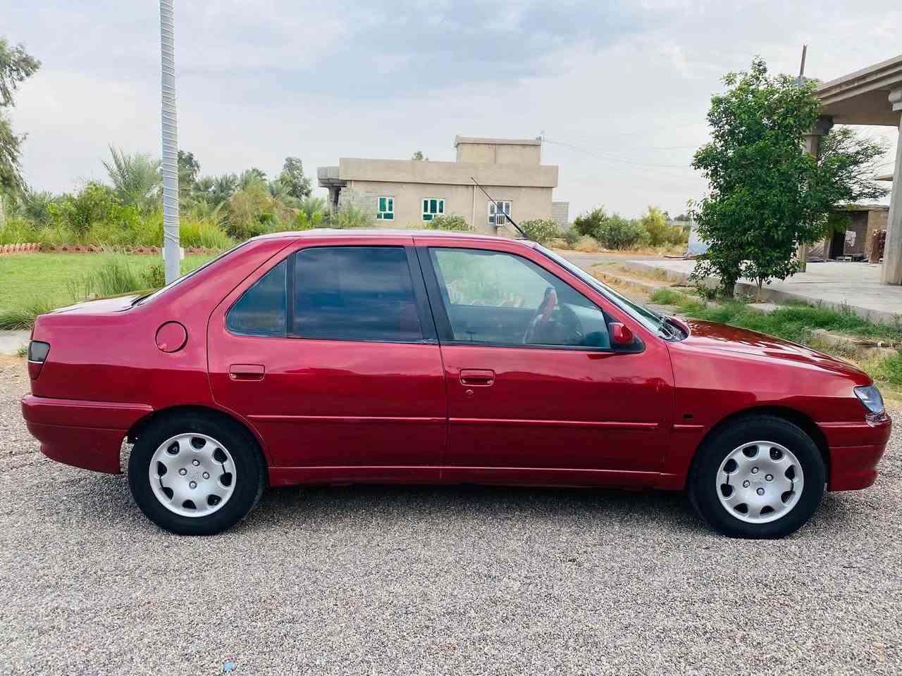 بيجو ٣٠٦ • ٢٠٠٢ • العلم