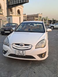 اكسنت 2011 شكل رياضي  لون ابيض خليجي  محرك 1600  غرفة السيارة كلش نضيف...